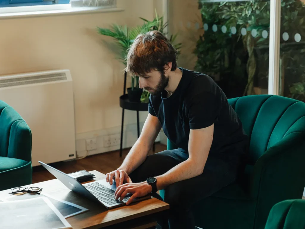 man using laptop